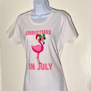Pink flamingo in Santa hat Christmas in July t-shirt